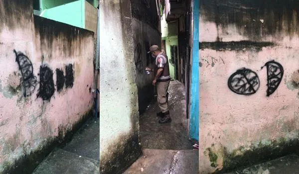 PM apaga pichações com nome do CP no Vale da Muriçoca; facção divulgou vídeos após invadir a localidade