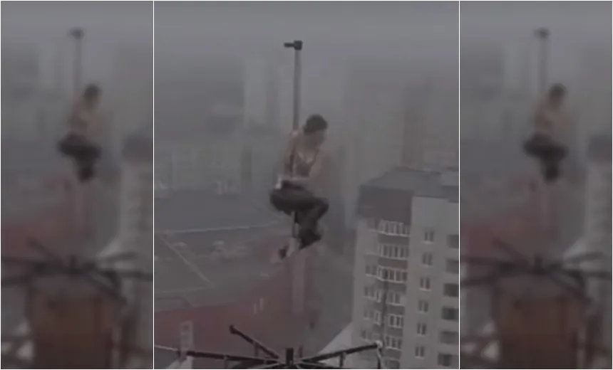 Bailarina se arrisca, sobe em prédio de 16 andares e faz pole dance; assista