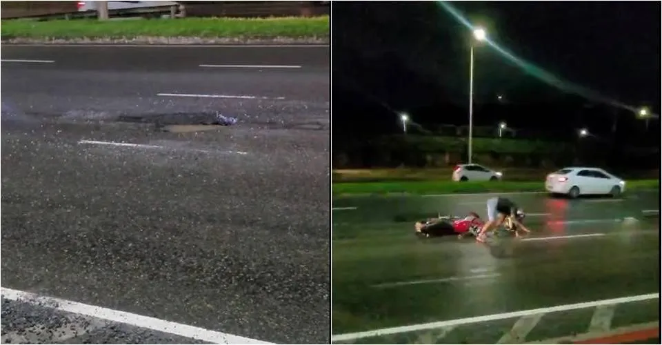 Perigo na Paralela! Motociclista sofre queda ao passar por buraco, em Salvador; veja vídeo