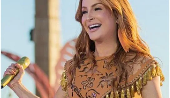 Claudia Leite é criticada após postagem com arma e bíblia nas redes sociais 
